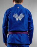 Trippy Butterfly embroidery on the back of a blue BJJ Gi