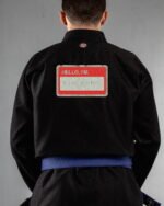Trying My Best embroidery on the back of a black BJJ Gi