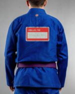 Trying My Best embroidery on the back of a blue BJJ Gi