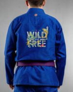 Wild & Free embroidery on the back of a blue BJJ Gi