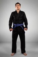 Model wearing the black GiFanatix BJJ Gi from the front